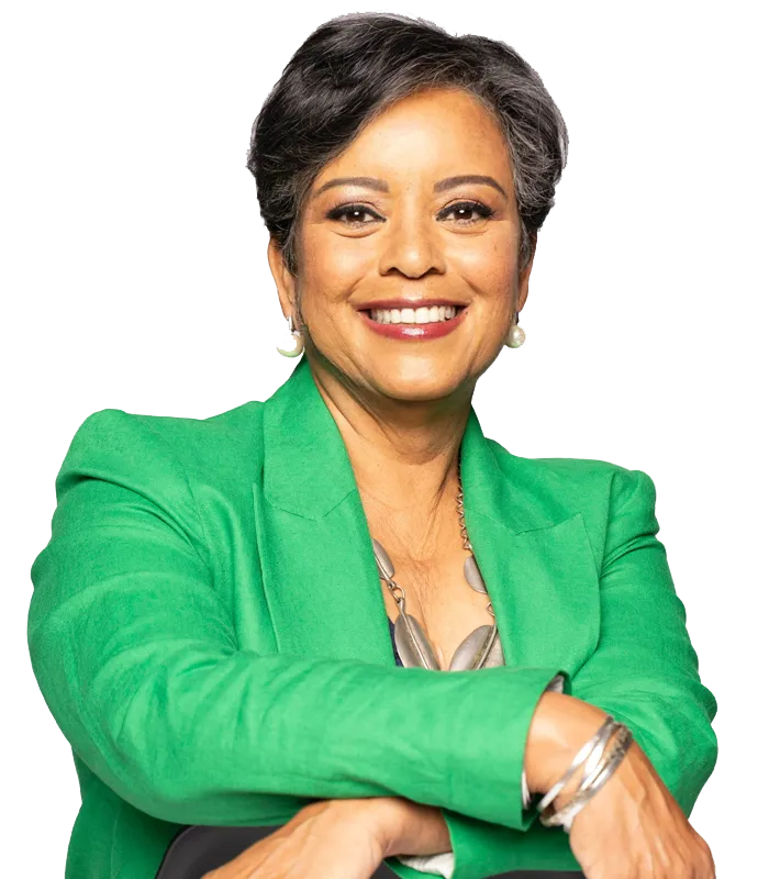 Mercedes Martin, founder and CEO of Mercedes Martin & Company, smiling in a bright green blazer
